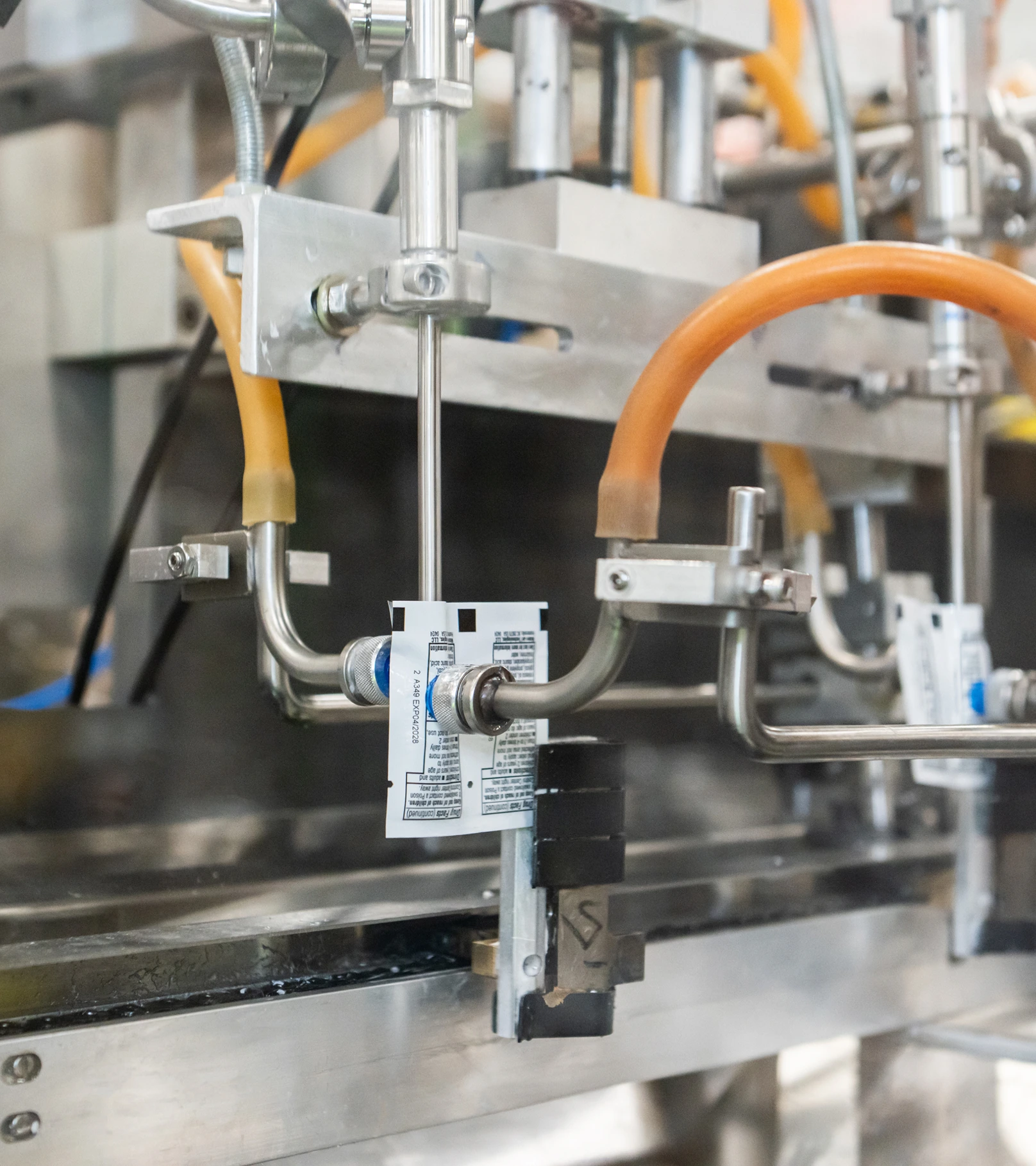Cosmetic packaging machine